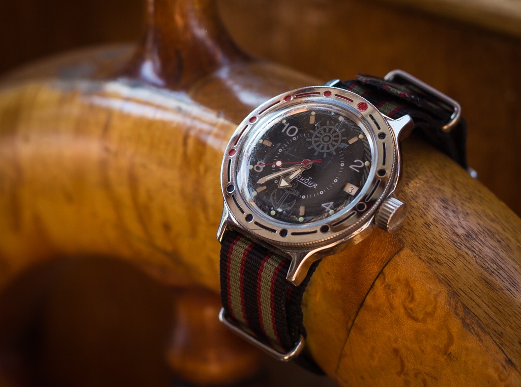 Vostok Amphibia Review – 'Zissou' displayed on wooden steering wheel.