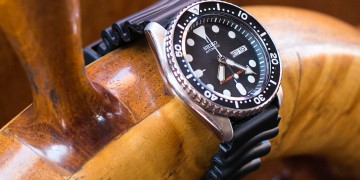 Seiko SKX007 Unboxing - Close shot of SKX007 displayed on ships wheel.