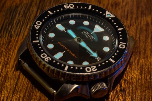 Seiko SKX007 glowing in the dark.