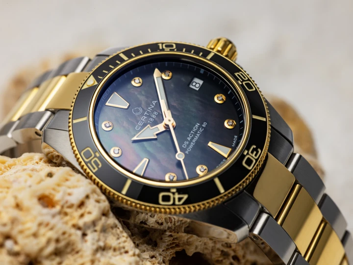 Stock photo of the Certina DS Action 34.5mm, with black Mother of Pearl dial, sitting on a rock