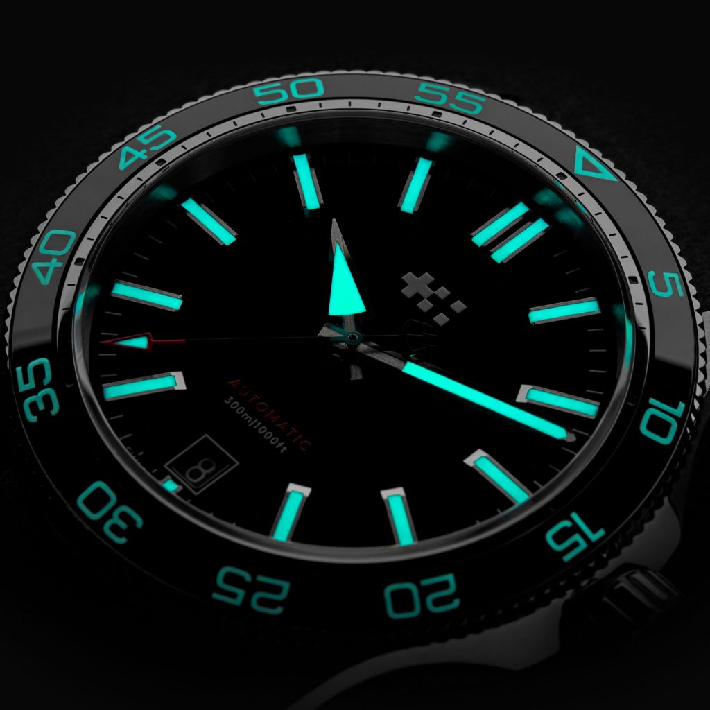 Photo showcasing the lume applied to the dial and bezel of the C60 Trident Pro