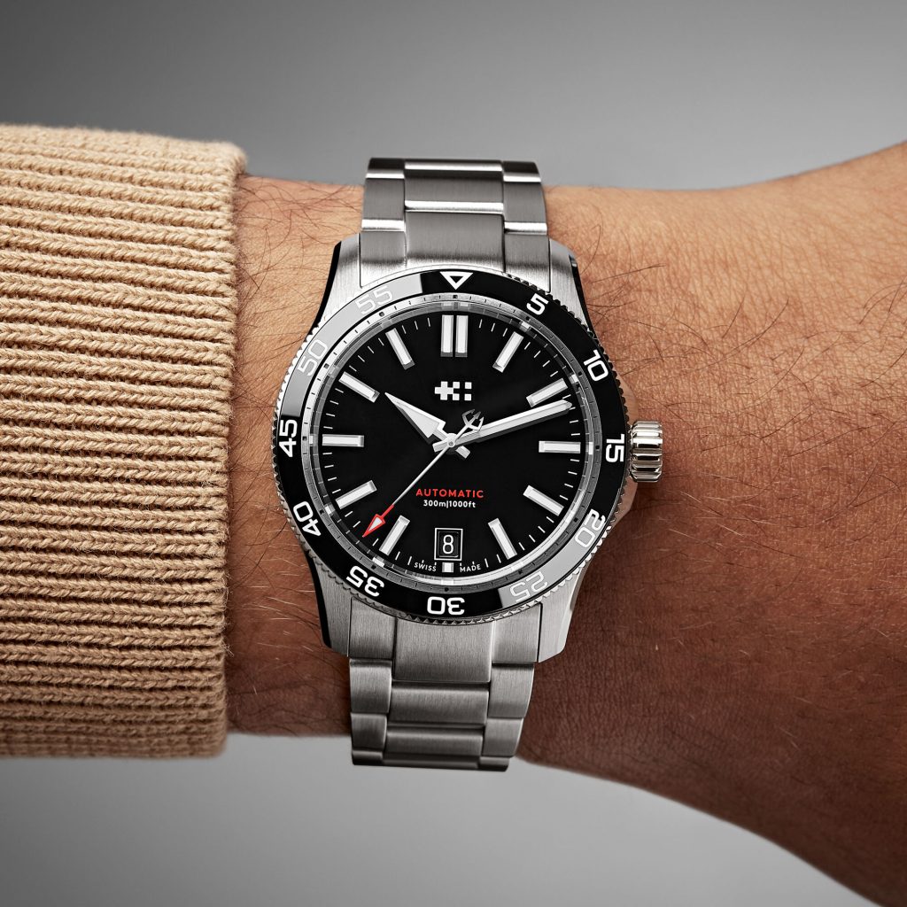 Stock photo showing the black dialed C60 Trident Pro on a model's wrist